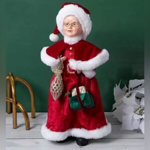 Mrs. Claus Holding Gifts